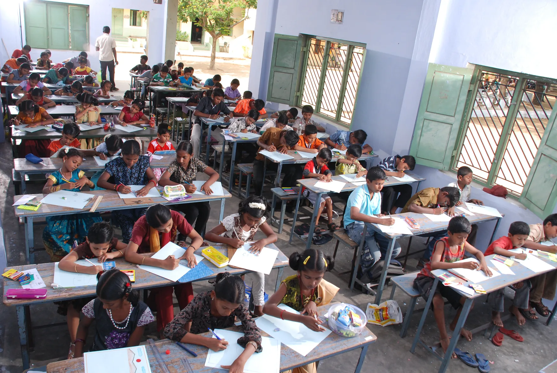 A classroom full of young artists, documented by The ART Foundation in 2011
