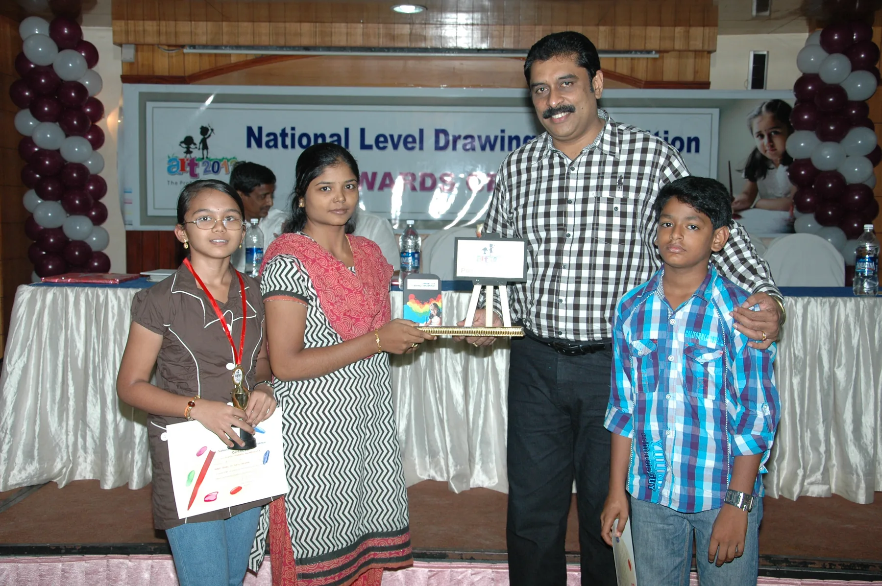 A proud young award recipient, documented by The ART Foundation in 2012