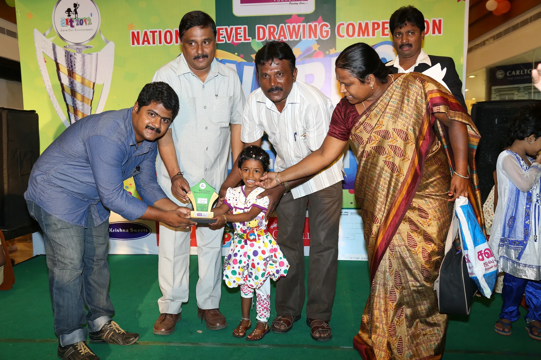 A joyful award presentation, documented by The ART Foundation in 2013