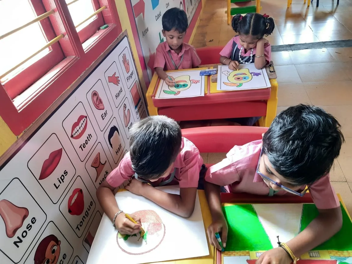 Creating together in the classroom, documented by The ART Foundation in 2022